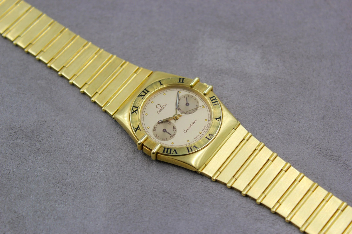 omega constellation day date gold